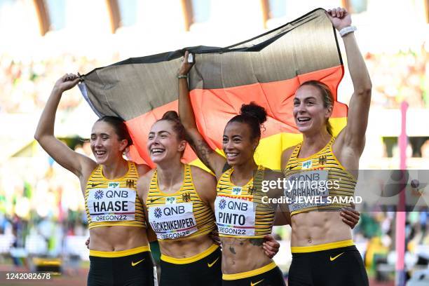 Germany's Rebekka Haase, Gina Luckenkemper, Alexandra Burghardt and Tatjana Pinto celebrate after winning bronze in the women's 4x100m relay final...