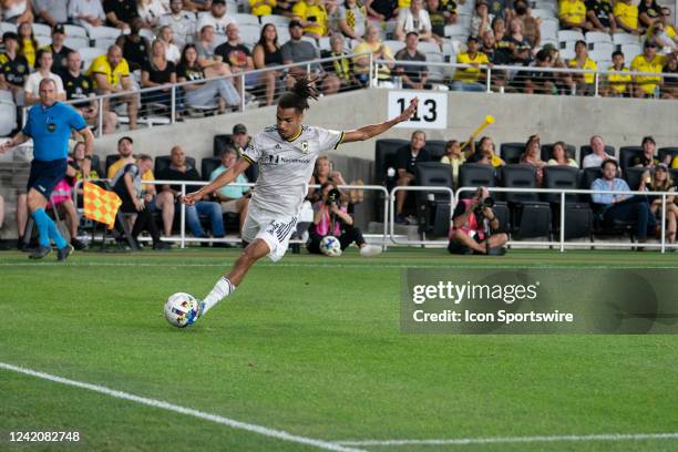 Columbus Crew defender Mohamed Farsi crosses the ball during the game between the Columbus Crew and the New England Revolution at Lower.com Field in...