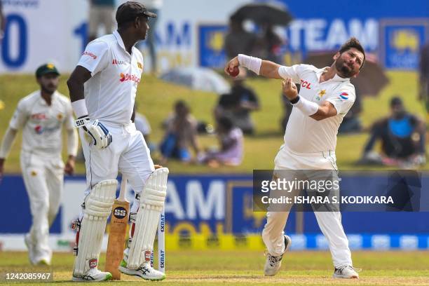 Pakistan's Yasir Shah delivers a ball during the first day of the second cricket Test match between Sri Lanka and Pakistan at the Galle International...
