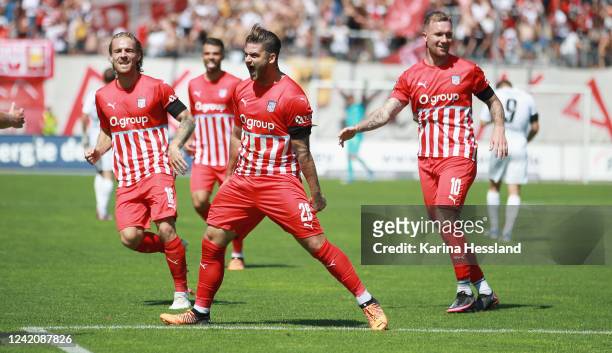 Dominic Baumann of Zwickau celebrates the second goal with teammates during the 3.Liga match between FSV Zwickau and Hallescher FC at GGZ-Arena on...