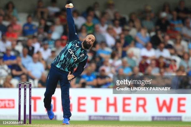 England's Moeen Ali bowls the ball on the third one-day international cricket match between England and South Africa at the Headingley cricket...