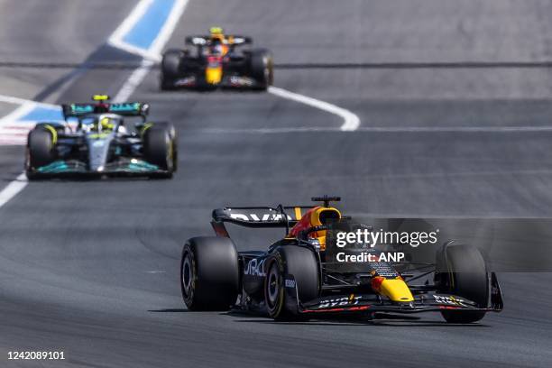 Max Verstappen in his Red Bull ahead of Lewis Hamilton in his Mercedes and Sergio Perez in his Red Bull during the F1 Grand Prix of France at Circuit...