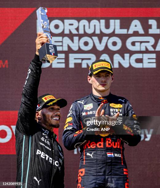 Lewis Hamilton and Max Verstappen on the podium after the F1 Grand Prix of France at Circuit Paul Ricard on July 24, 2022 in Le Castellet, France....