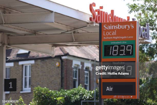 Fuel prices at a Sainsburys Local petrol station on July 24, 2022 in London, England. Many Supermarket Fuel Stations are still charging high prices...