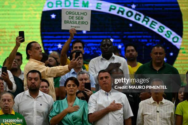 Brazil's President Jair Bolsonaro and his wife Michelle Bolsonaro attend the Liberal Party national convention where he was officially appointed as...