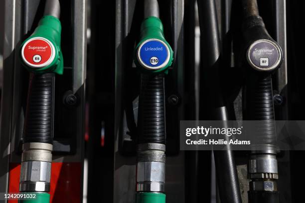 Fuel pump at an Esso Tesco petrol station on July 24, 2022 in London, England. Many Supermarket Fuel Stations are still charging high prices on the...