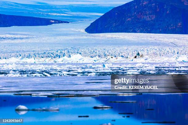 Icebergs float in Baffin Bay near Pituffik, Greenland on July 18, 2022 as captured on a NASA Gulfstream V plane while on an airborne mission to...