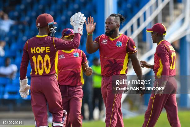 Kyle Mayers of West Indies celebrates the dismissal of Suryakumar Yadav of India during the 2nd ODI match between West Indies and India at Queens...