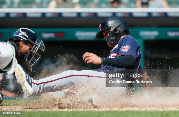 Gio Urshela of the Minnesota Twins scores against the Detroit Tigers on a double hit by Luis Arraez during the seventh inning at Comerica Park on...