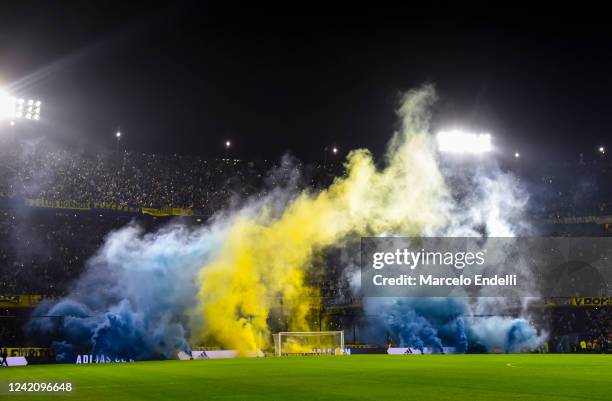 Fans of Boca Juniors cheer for their team before a match between Boca Juniors and Estudiantes La Plata as part of Liga Profesional 2022 at Estadio...