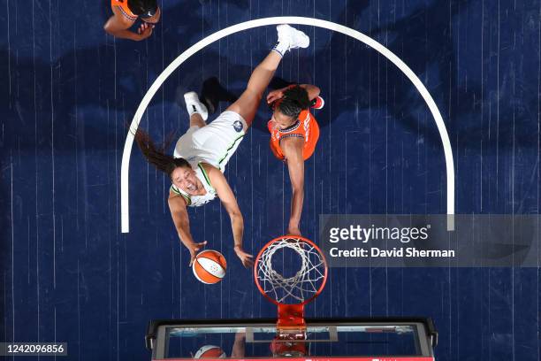 Natalie Achonwa of the Minnesota Lynx drives to the basket during the game against the Connecticut Sun on July 24, 2022 at the Target Center in...