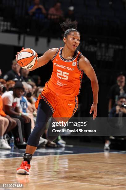 Alyssa Thomas of the Connecticut Sun dribbles the ball during the game against the Minnesota Lynx on July 24, 2022 at the Target Center in...