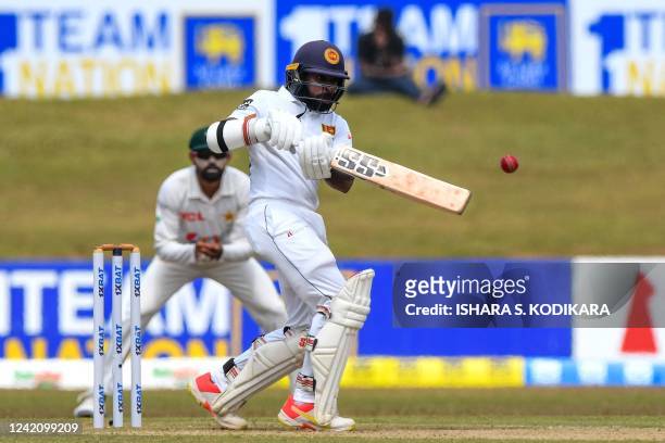 Sri Lanka's Niroshan Dickwella plays a shot during the second day of the second cricket Test match between Sri Lanka and Pakistan at the Galle...