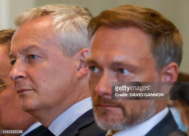 German Finance Minister Christian Lindner and France's Finance Minister Bruno Le Maire attend a ceremony during which Le Maire will be awarded with...