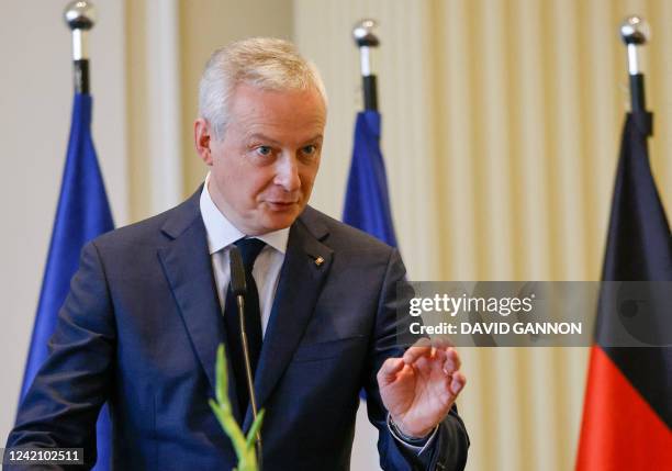 France's Finance Minister Bruno Le Maire speaks after he was awarded by his German counterpart with the Great Cross of Merit with Star and Sash of...