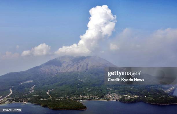 Photo taken July 25 from a Kyodo News plane shows a volcano on Sakurajima in Kagoshima Prefecture, southwestern Japan, following a series of...