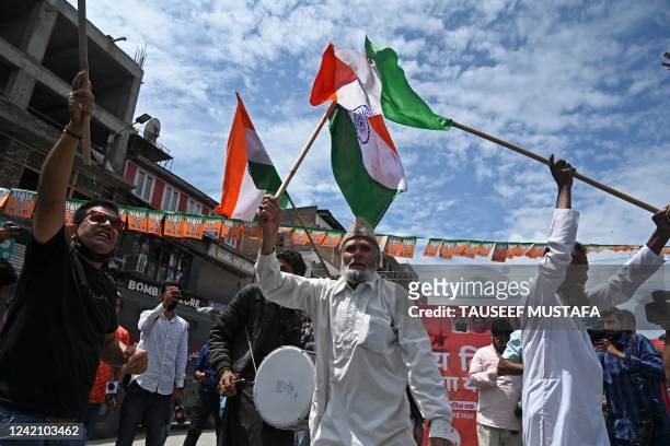 Supporters of India's Bharatiya Janata Party attend the Tiranga bikers rally at the clock tower in Lal Chowk area of Srinagar on July 25, 2022. - BJP...