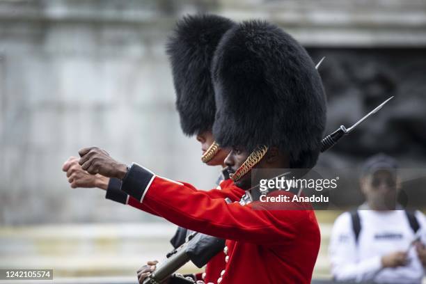 The Grenadier Guards perform the Changing of the Guard outside Buckingham Palace in London, United Kingdom on July 25, 2022. The Changing of the...
