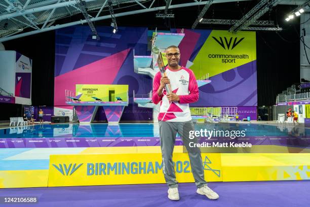 Richie Anderson takes part in The Queen's Baton Relay as it visits Sandwell Aquatics as part of the Birmingham 2022 Queens Baton Relay on July 25,...