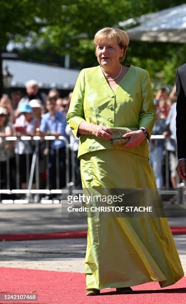 Former German chancellor Angela Merkel arrives for the opening of the annual Bayreuth Festival featuring the music of German composer Richard Wagner...