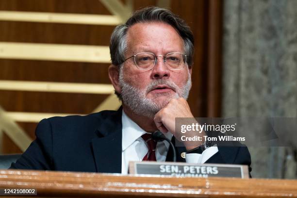 Chairman Gary Peters, D-Mich., listens to David Pekoske, nominee to be administrator of the Transportation Security Administration, testify during...