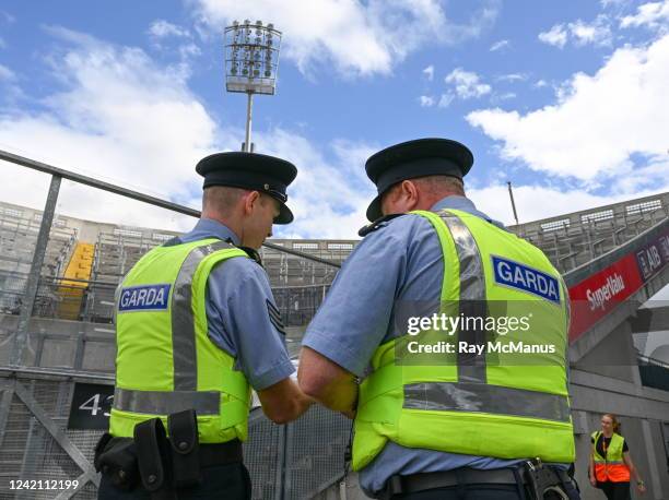 Dublin , Ireland - 24 July 2022; Gardai compare notes in advance of the GAA Football All-Ireland Senior Championship Final match between Kerry and...