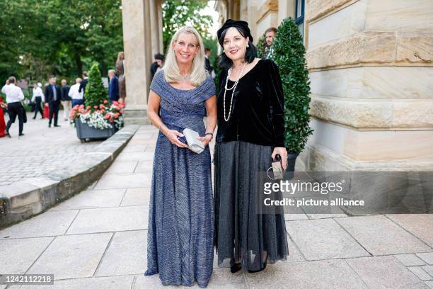 July 2022, Bavaria, Bayreuth: Karin Baumüller-Söder and Linda Rama at the opening of the Bayreuth Richard Wagner Festival in the Festspielhaus on the...
