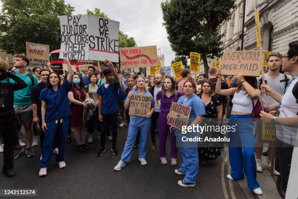 Doctors, NHS workers and health campaigners protest outside Downing Street calling for pay restoration for doctors in London, United Kingdom on July...