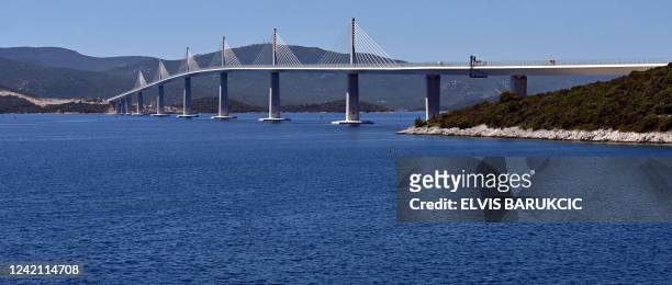 Photograph shows a view of the "Peljesac" bridge in Ston on July 18, 2022. The bridge linking Peljesac peninsula with the Croatian mainland has been...