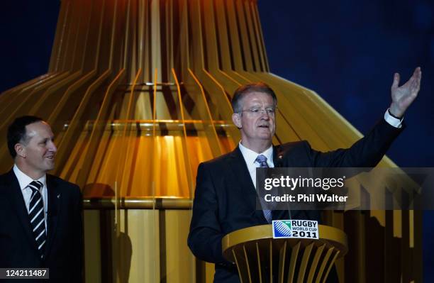 New Zealand prime minister John Key looks on as IRB Chairman Bernard Lapasset speaks during the IRB 2011 Rugby World Cup Opening Ceremony at Eden...