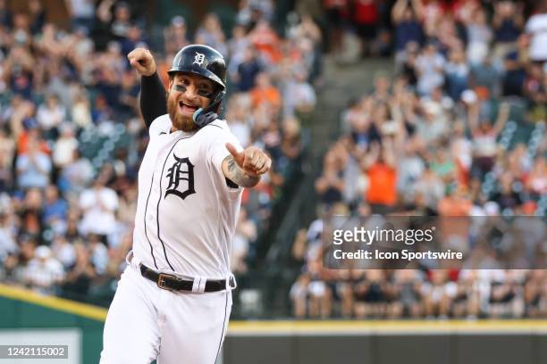 Detroit Tigers catcher Eric Haase celebrates as he runs around the bases after hitting a grand slam home run during the third inning of a regular...
