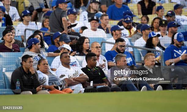 Family of Juan Soto of the Washington Nationals, seated behind home plate, attend the the baseball game against the Los Angeles Dodgers with Soto's...