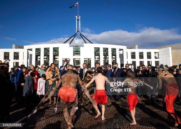 Australia's newly elected members of the Parliament attend a traditional smoking ceremony to mark the opening of the 47th Federal Parliament in front...