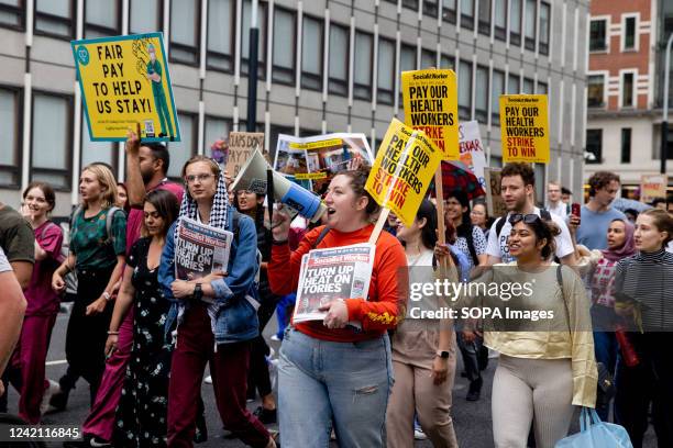 Healthcare professionals, including doctors and nurses, are chanting slogans and marching to Downing Street. NHS doctors, nurses, and other allied...