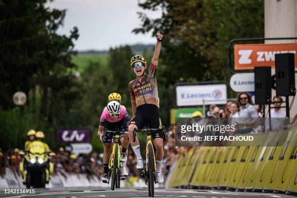 Jumbo Visma's Dutch rider Marianne Vos celebrates as she crosses the finish line to win the 2nd stage of the new edition of the Women's Tour de...