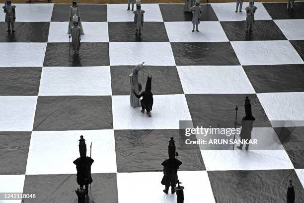 Children dressed as chess pieces perform during an event organised ahead of the 44th Chess Olympiad 2022, in Chennai on July 26, 2022.