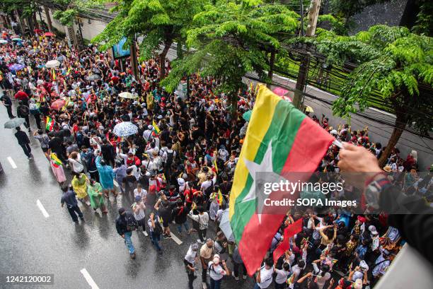 Burmese people seen gathered outside the Myanmar embassy during the demonstration in Bangkok, Thailand. Protesters gathered outside the Myanmar...