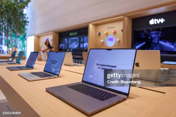 MacBook laptop computers at the new Apple Inc. Store, due to open to the public on Thursday, in the Knightsbridge district of London, UK, on Tuesday,...