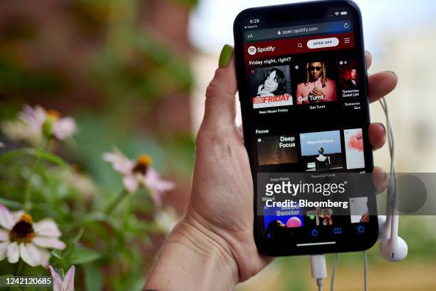 The Spotify website on a smartphone arranged in the Brooklyn borough of New York, US, on Friday, July 22, 2022. Spotify Technology SA is scheduled to...