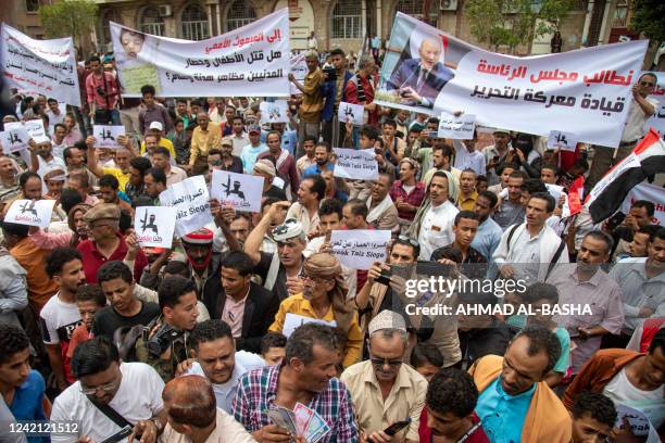 Yemeni demonstrators protest demanding the end of a years-long blockade of the area imposed by Yemen's Huthi rebels on the Yemeni third city on July...