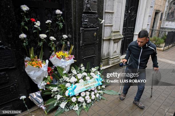 Man visits the grave of former First Lady Eva Peron at the Recoleta cemetery in Buenos Aires, on July 26 during the 70th anniversary of her death. -...