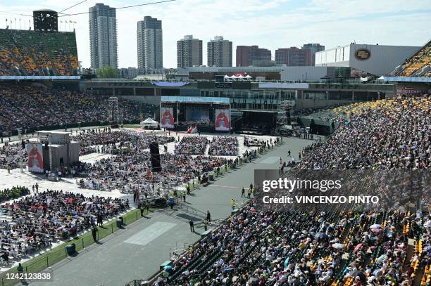 Pope Francis participates in an open-air mass at Commonwealth Stadium in Edmonton, Canada, on July 26, 2022. - The Pope will be celebrating the feast...