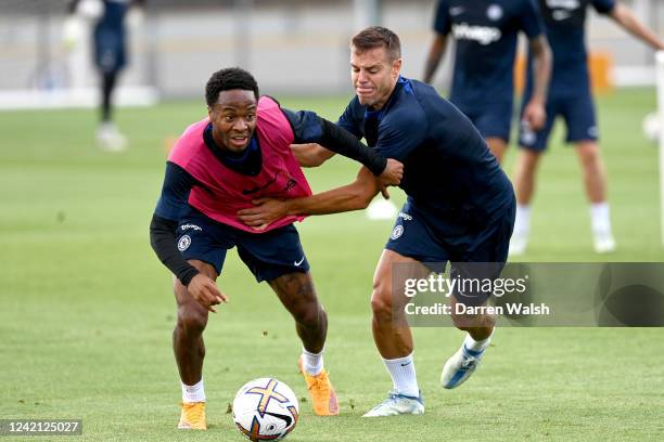 Raheem Sterling and César Azpilicueta of Chelsea during a training session at Chelsea Training Ground on July 26, 2022 in Cobham, England.