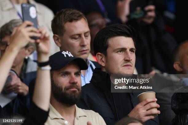 Harry Maguire and Juan Mata of Manchester United looks on during the UEFA Women's Euro England 2022 Semi Final match between England and...