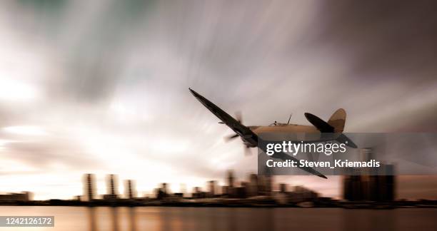 detroit, michigan - world war ii warplane fly by - world war ii canada stock pictures, royalty-free photos & images