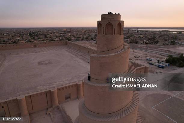 An aerial view shows the spiral Malwiya minaret, a mid-ninth century treasured Iraqi national monument, at the site of the Great Mosque of Samarra,...