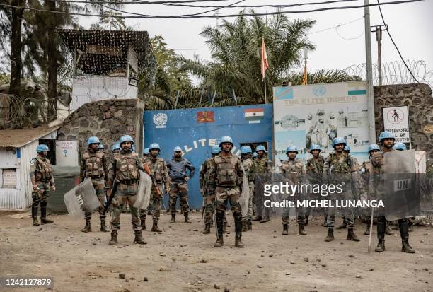 Indian soldiers of the UN peacekeeping mission MONUSCO take position in front of a UN base in Goma on July 26, 2022. Three United Nations...