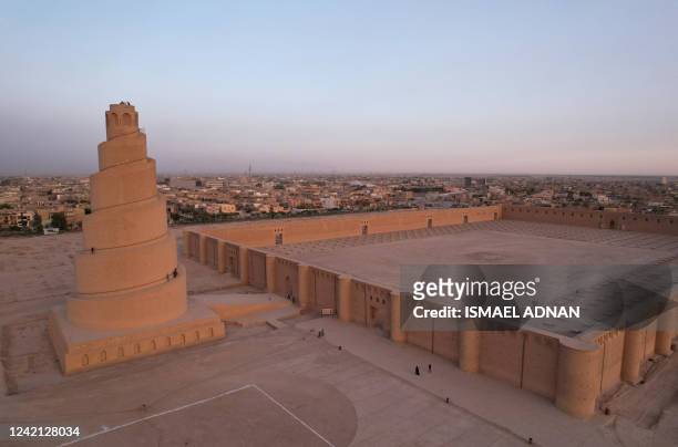 An aerial view shows the spiral Malwiya minaret, a mid-ninth century treasured Iraqi national monument, at the site of the Great Mosque of Samarra,...