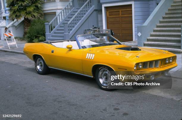 Nash Bridges," a police drama, featuring a canary yellow 1970 Plymouth Barracuda convertible , 1997.