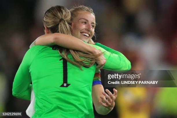 England's goalkeeper Mary Earps and England's midfielder Leah Williamson celebrate after winning at the end of the UEFA Women's Euro 2022 semi-final...